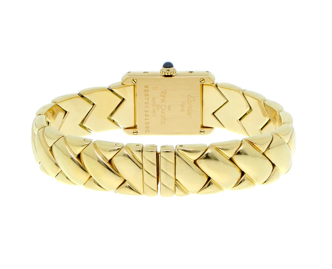 Yellow gold cartier tank watch